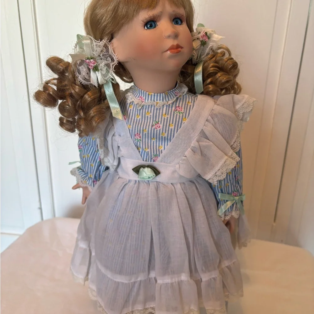 Charming Blue and White Porcelain Doll with Curly Hair - Picture 1 of 11